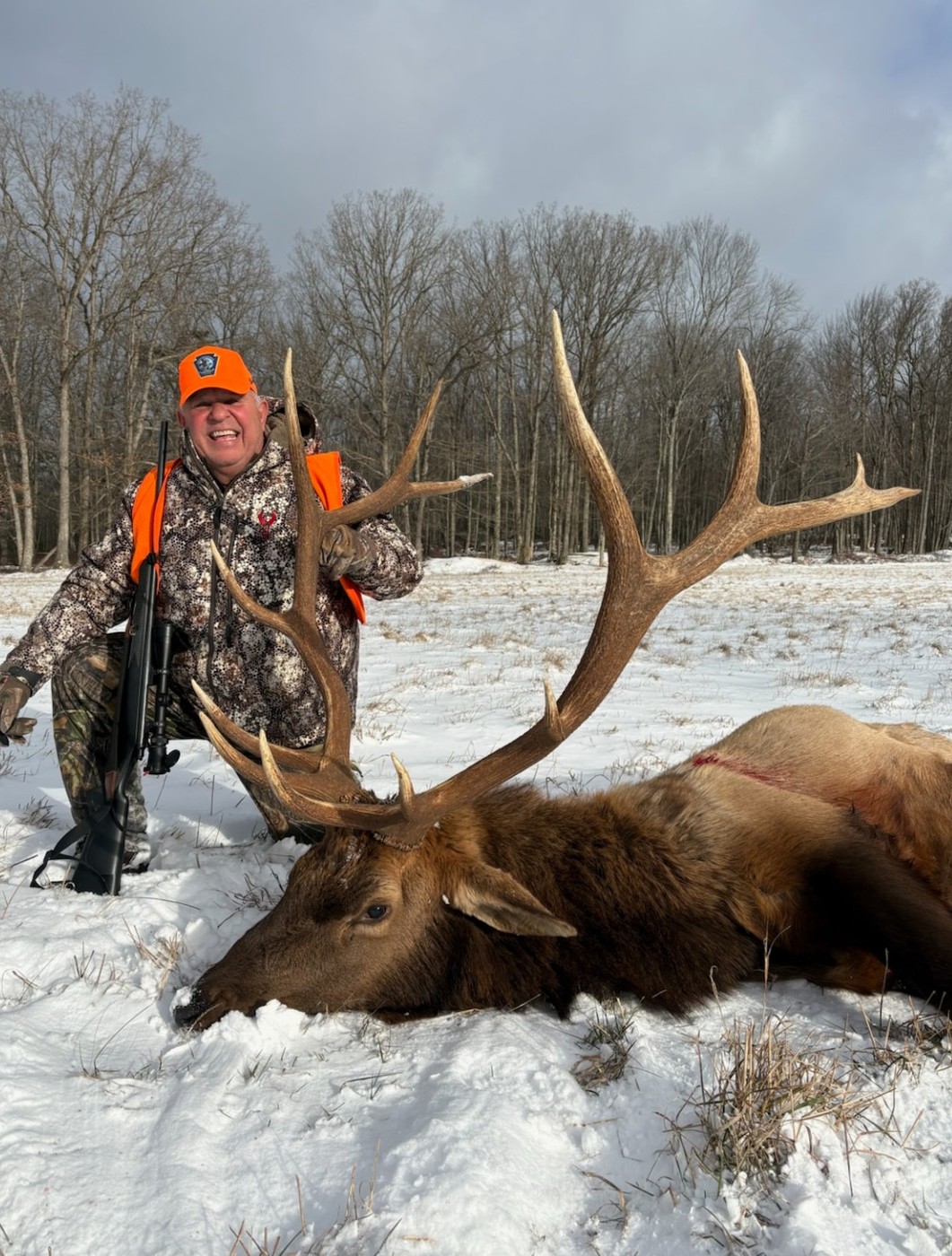 Eugene Dellar with Pennsylvania bull elk in the snow